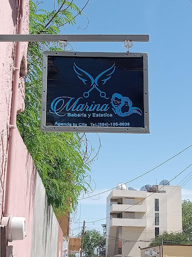Barbería y estética Marina