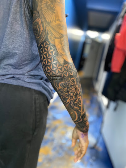 Foto de scarred with ink tattoos