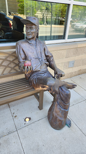 Johnny Appleseed statue on bench