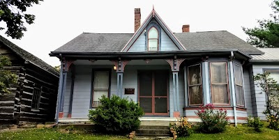 Oliver Tucker Museum And Old Log House