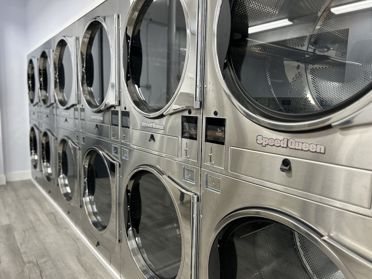 Clean laundry equipment at Coastal Plaza Laundromat II in Saco, ME