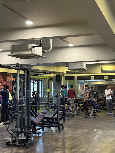 DYNAMO Gym Total Fitness And Health Cafe