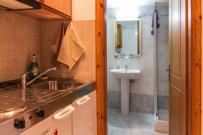 Opinii despre Captain George Apartments în Σύμη - Ξενοδοχείο