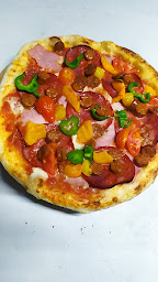 Photo n°24 de La dolce vita - pizzas traditionnelles à Laurenan (Pizzeria)