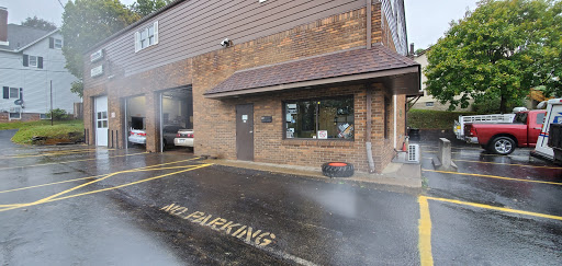 Spino's Tire by Car Care 1 Logo