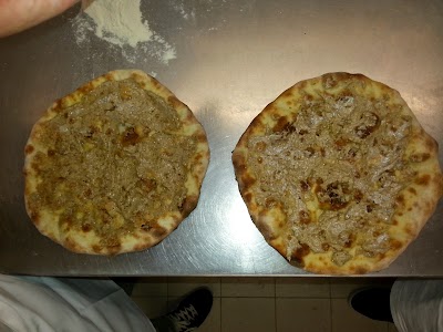 Photos of Mezzosacco pizza and diner