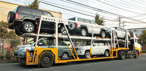 Mighty Auto Transport Logo