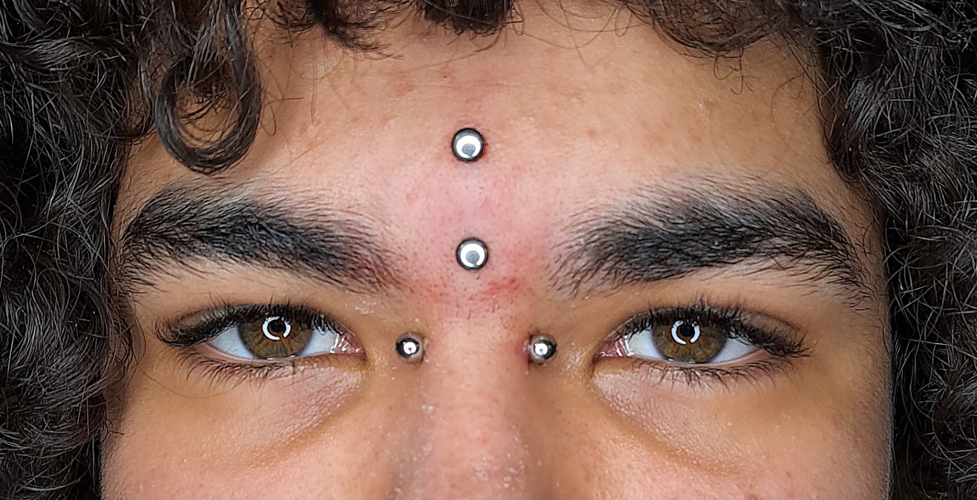Two Wheels Tattoo & Piercing