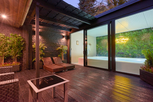 Photo de Les Cottages du Parc - Chambres & Spa privatif