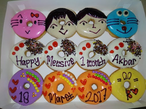 Donat Madu, Author: Siti Janah