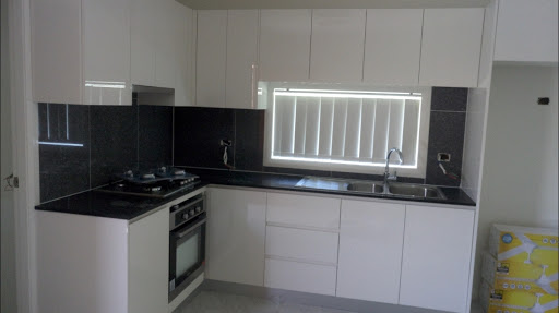 Deluxe kitchens sydney Logo