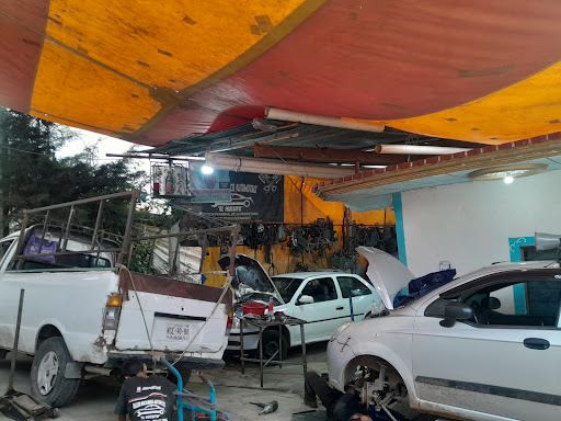 TALLER MECANICO ¨EL HUESITO¨