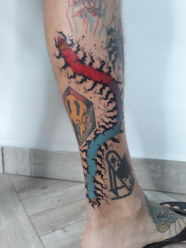 Mono Ciego Tattoo Logo