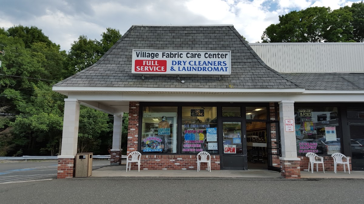 Village Fabric Care Center laundromat interior in Waterbury, CT