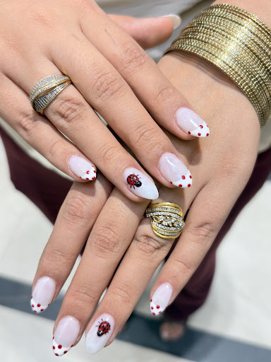 ✨ Elegant Ladybug Nail Art at Beautista Luxury Salon, Zirakpur 🐞💅 post image