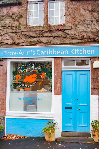 Troy - Ann's Caribbean Kitchen Logo