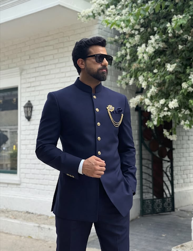 Step up your ethnic style game with this stunning navy blue Jodhpuri suit from Shree Radhey Fabri… post image