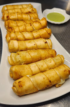 Foto de Delicateses Criollas - Restaurants - Comida Venezolana Rollito de primavera