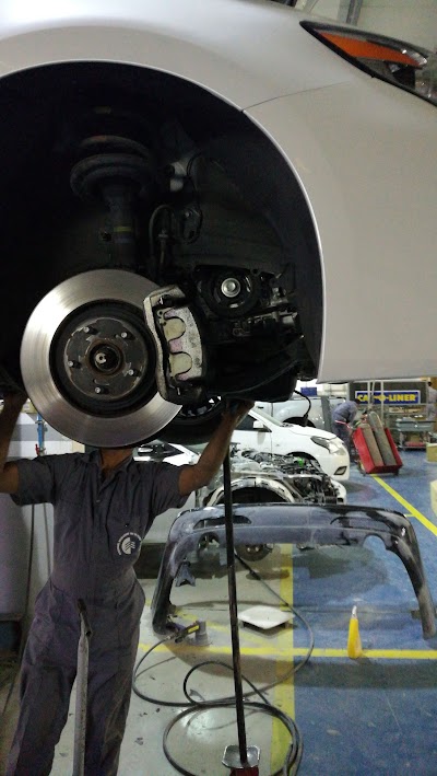 Photos of Dynatrade Auto Service Center LLC ,body shop Al Ain