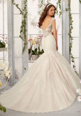 M & J Bridal Boutique/PROM/Tuxedo Rental Bridal Quinciañera baptism communion,bridesmaid.