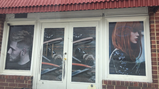 La Tijera Dorada Hair Salon y Barberia