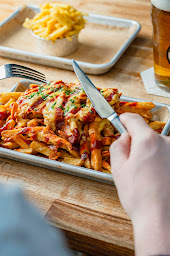 Photo n°6 de Rosie's Smokehouse BBQ | American Steakhouse & Sports Bar à Paris (Bar sportif)