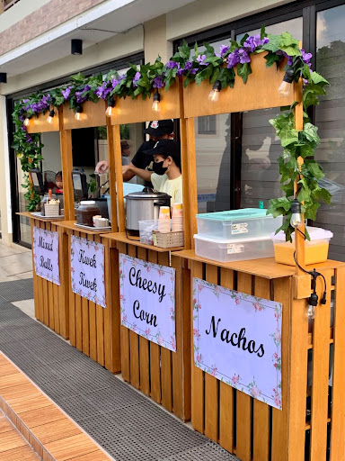 Treat your guests to a delicious and healthy snack with the Sweet Corn Stall by Red Roses Events… post image