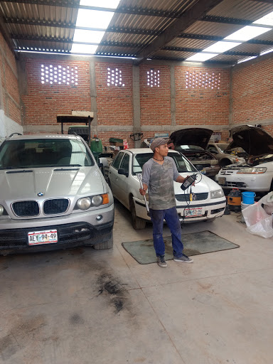 Taller Mecanico Daniel Logo