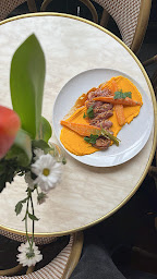 Photo n°56 de Restaurant brasserie Grizzli Café à Paris (Brasserie)