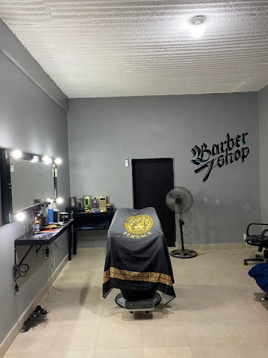 "De la Garza" Barber Shop.