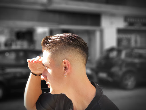 Barbería Peluquería KM Logo
