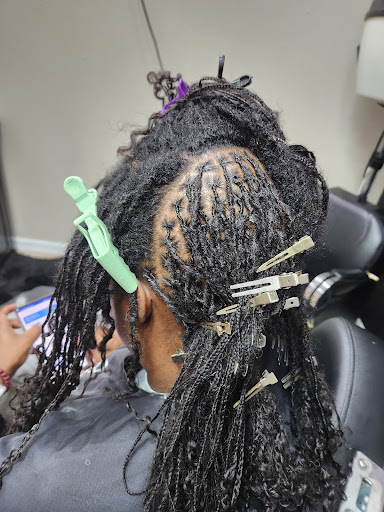 Mahogany's Beauty and Dreadlocks located at Expose Hair Loft - United States