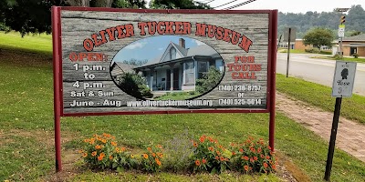 Oliver Tucker Museum And Old Log House