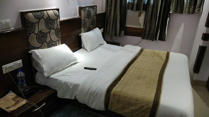 Anoop Hotel, Author: Komal Sharma