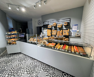 Photo n°21 de Boulangerie Poulain à Bréal-sous-Montfort (Pâtisserie)