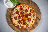 Pizza l'authentique distributeur automatique 24/7 à Saint-Michel