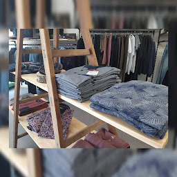 Photo n°17 de Appartement 11 à Saône (Magasin de vêtements pour hommes)