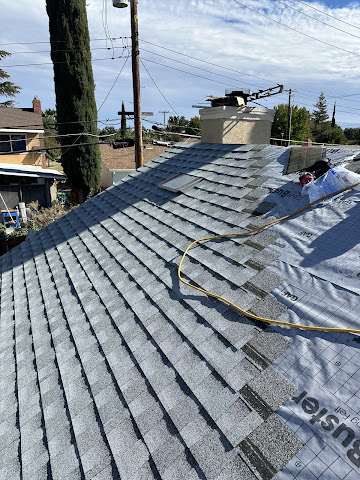 Front view of SM Roofing in  - Verified Roofing Contractor nearby.