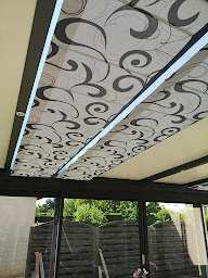 Photo n°9 de Komilfo Huguet Thibault à Poitiers - Pergolas, Stores, Fenêtres, Menuiseries à Poitiers (Magasin de rideaux et stores)