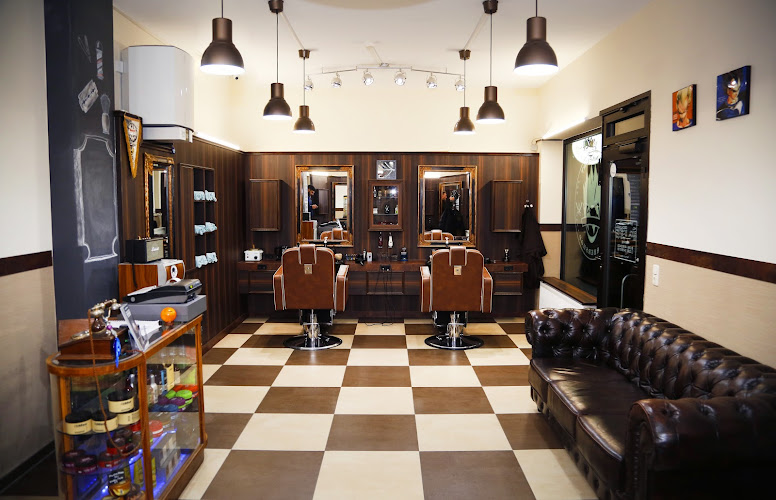 THE MAN'S WORLD Barbershop