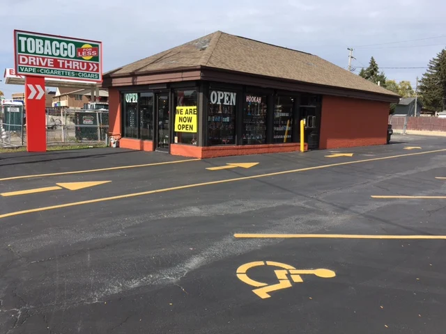 TOBACCO FOR LESS - DRIVE THRU SMOKE SHOP photo