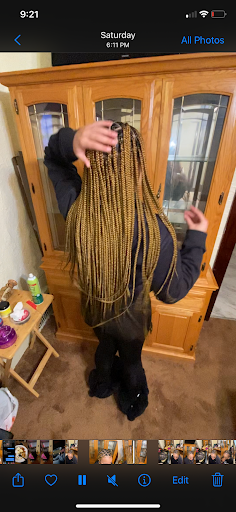 Queens’ hair braiding style