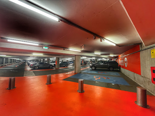 John Lewis Car Park Pay Point and Entrance to Shops Logo