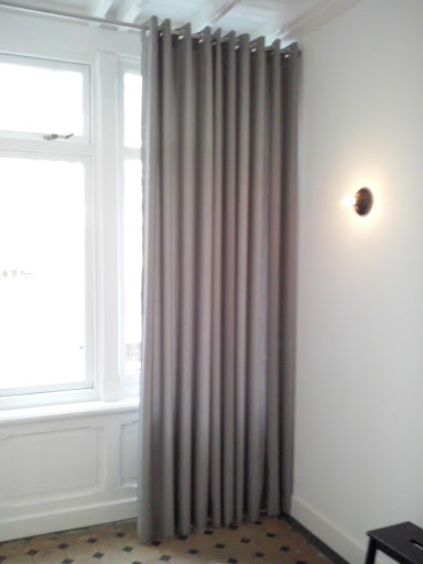 Woningstoffering Vloerbedekking gordijnen trapbekleding