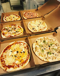 Photo n°41 de La Dolce Pizzas à Les Belleville (Livraison de pizzas)