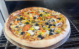 Photo n°32 de Pizza Gourmand à Illkirch-Graffenstaden (Pizzas à emporter)