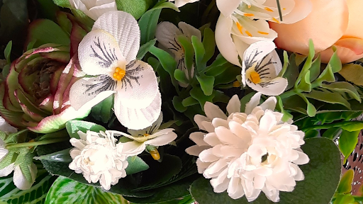 Astrid Assenmacher Seidenblumen mit Herz Logo
