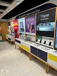 Photo n°6 de Welcom | Téléphones, reconditionnés, forfaits mobile, box internet fibre, réparation et reprise à Lempdes (Magasin de téléphonie mobile)