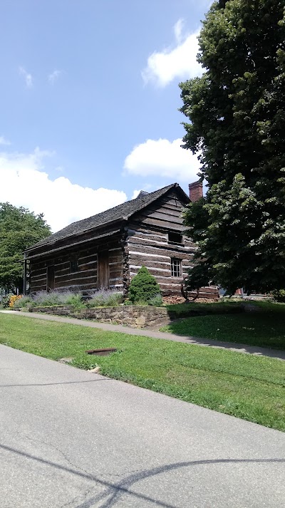 Oliver Tucker Museum And Old Log House