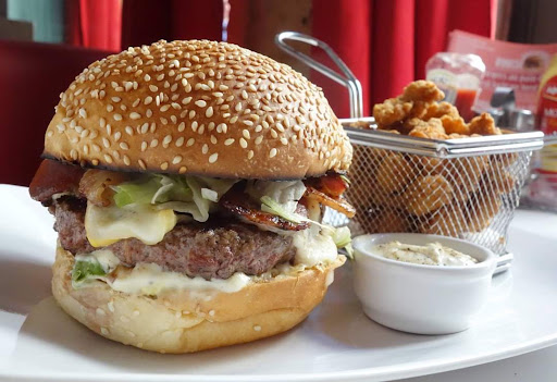 Restaurant chez Pinch, Burgers, wraps & salades Livraison à domicile